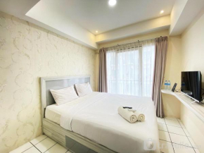 Comfy Studio Room at Grand Asia Afrika Apartment By Travelio